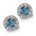 pendientes de oro blanco con topacio azul suizo y orla de brillantes