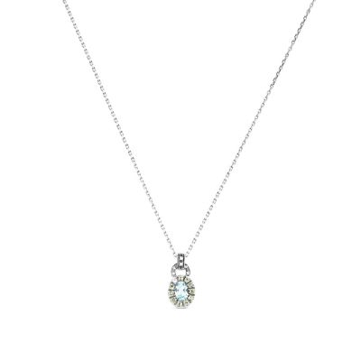 Colgante de oro blanco con diamantes y topacio azul con orla de pavé de diamantes