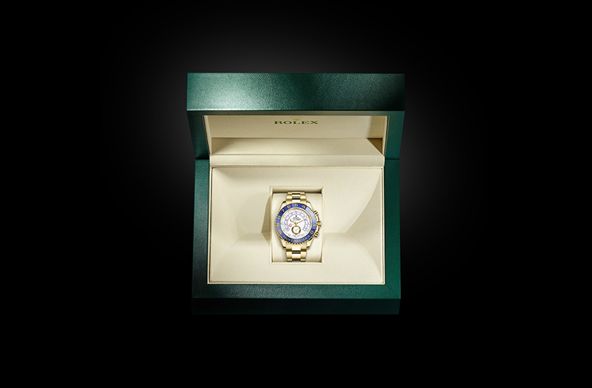 Estuche reloj Rolex Yacht-Master II de oro amarillo y esfera blanca  Chocrón Joyeros
